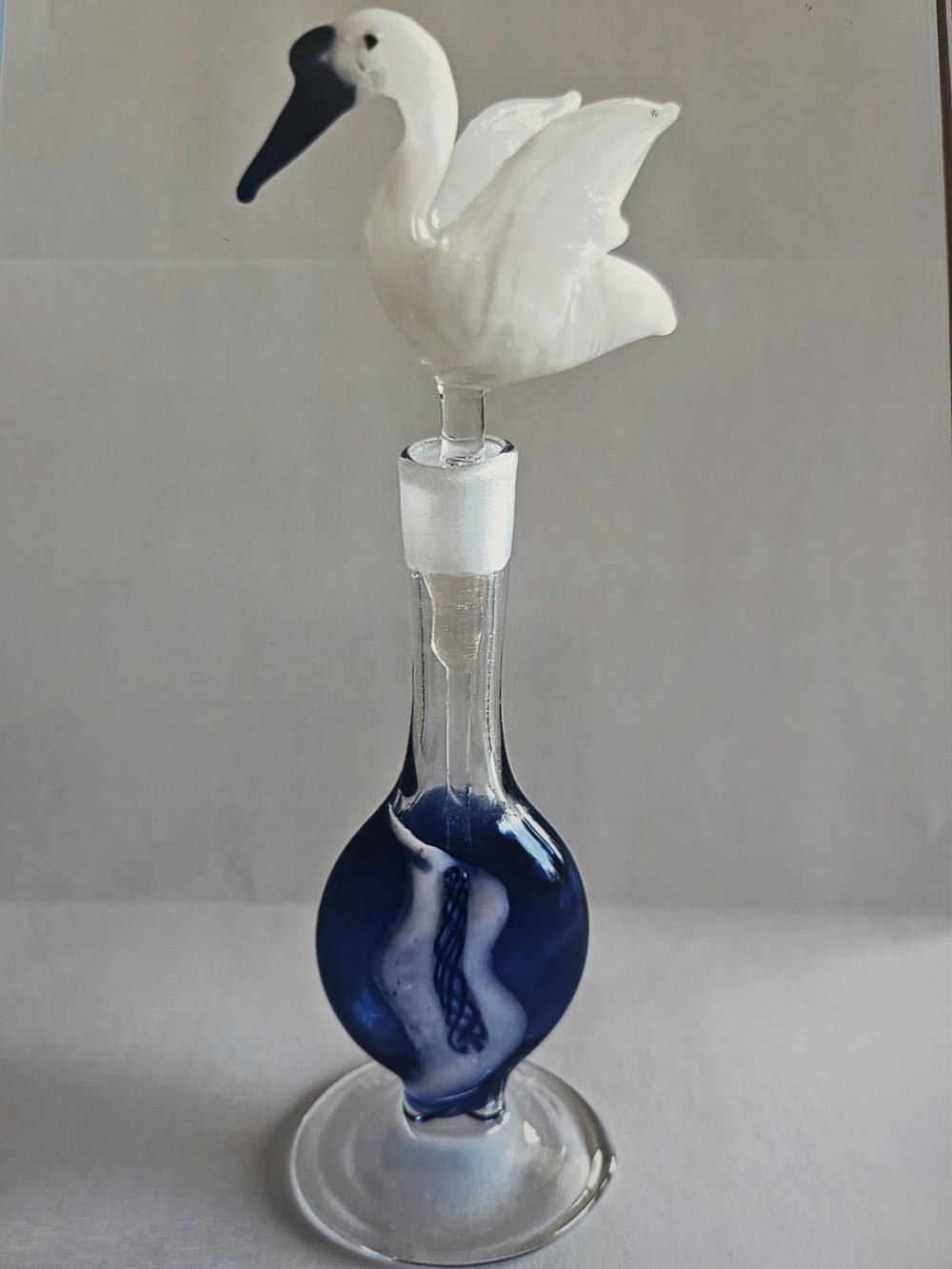 Handblown White Swan Glass Perfume Bottle with Deep Blue Accent